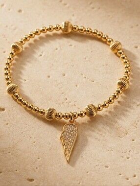 Gold Beaded Angel Wing Charm Bracelet